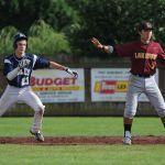 Arlington&rsquo;s Jack Sheward (left) retreats back to second base as Lakeside shortstop Zane Baker looks for the throw during the fourth inning of Sunday&rsquo;s Class 3A regional championship game.