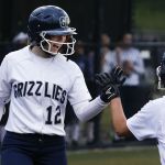 Glacier Peak&rsquo;s Megan Parsley (12) high-fives teammate Harlee Carpenter (14) during the 3A District 1 third-place game against Marysville Pilchuck on Thursday at Phil Johnson Fields in Everett.