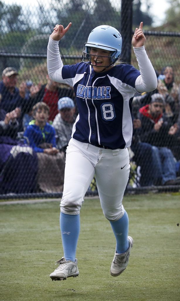 Meadowdale&rsquo;s Samantha Gregoryk celebrates a home run as she rounds third base during the 3A District 1 championship game against Everett on Thursday at Phil Johnson Fields in Everett.