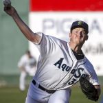 The AquaSox&rsquo;s Ljay Newsome throws a pitch against the Everett Merchants during the 13th annual Everett Cup on Wednesday at Everett Memorial Stadium.