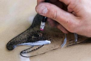 Fresh Paint featured artist paints backward on glass