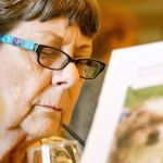 Kevin Clark / The Daily Herald                                Patricia Roberts along with other residents and guests of Everett Garden Court Retirement Community paints pictures of the elderly dogs and cats available for adoption Friday afternoon in Everett on June 10, 2016.