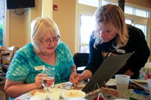 Paint-and-sip pairs seniors on two legs and four