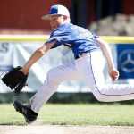 Pacific Little League All-Star team member Lane Corsi fields a ground ball during a practice at Lynndale Park in Lynnwood on Tuesday. (Ian Terry / The Herald)