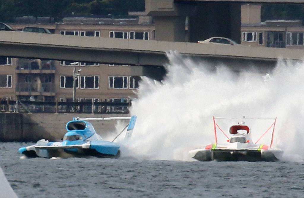 U-1 Miss HomeStreet driven by Jimmy Shane, left, U-9 Sound Propeller Services Presents Les Schwab Tires driven by Andrew Tate race during the Seafair Hydroplane race Sunday afternoon in Seattle. (Kevin Clark / The Daily Herald)