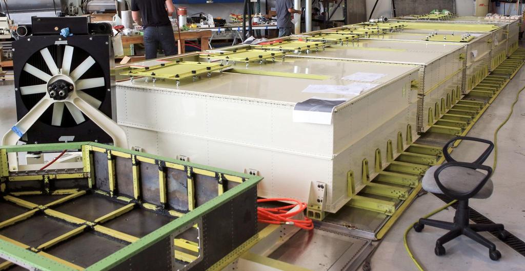 Kevin Clark / The Daily Herald                                The first run of oil dispersion units dot the floor of Waypoint Aeronautical Wednesday morning at Paine Field in Everett on August 10, 2016.