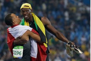 Bolt is first to win three straight Olympic 100-meter titles