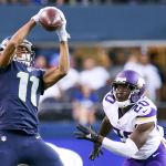 Seahawks wide receiver Kenny Lawler makes a catch with the Vikings&rsquo; Mackensie Alexander defending during a preseason game Thursday night at CenturyLink Field in Seattle. (Kevin Clark / The Herald)