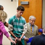 Allen Ivanov, 19, is led into Snohomish County superior court, Monday, where attorneys, Karen Halverson (left) and Walter Peale seat him before Superior Court Judge Thomas J. Wynne to face arraignment. Ivanov is accused of gunning down three former Kamiak High School classmates, including his former girlfriend. (Dan Bates/The Herald)