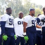 The Seahawks&rsquo; Jarran Reed (90), Jordan Hill (97) and Michael Bennett (72) joke between drills during a Seahawks practice last week. (Genna Martin/Seattlepi.com via AP)