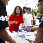 Karla Rios, of Everett, helps coordinate events scheduled during Edmonds Community College&rsquo;s Latino Expo on Saturday, Aug. 13. Rios, who recently graduated from Washington State University, has been volunteering for four years with the Latino Educational Training Institute. (Ian Terry / The Herald)