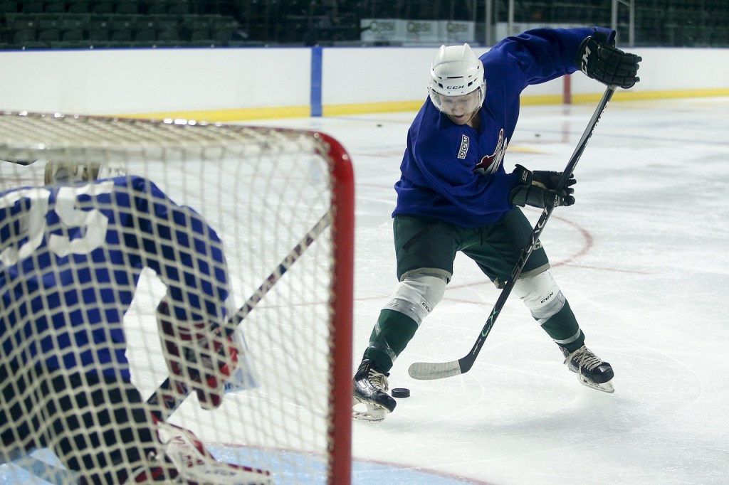 Sean Mallonee shows off his stick-handling skills during the first day of Silvertips training camp Thursday at Xfinity Arena in Everett. (Ian Terry / The Herald)