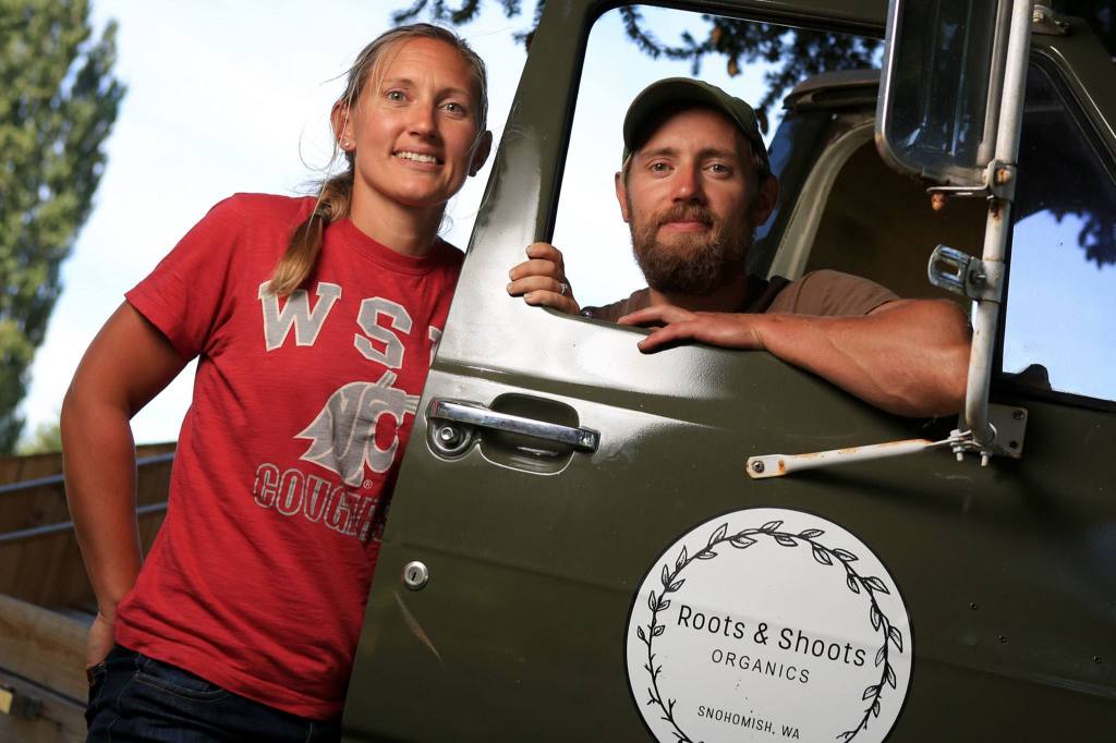 Beth Kendall, formerly Beth Krause, lives on her family&rsquo;s farm where she grows flowers. Her brother, Curt Krause, leasesland to grow organic fruit and vegetables. The Krauses are this year&rsquo;s Evegreen State Fair Centennial Farm Family. (Kevin Clark / The Herald)