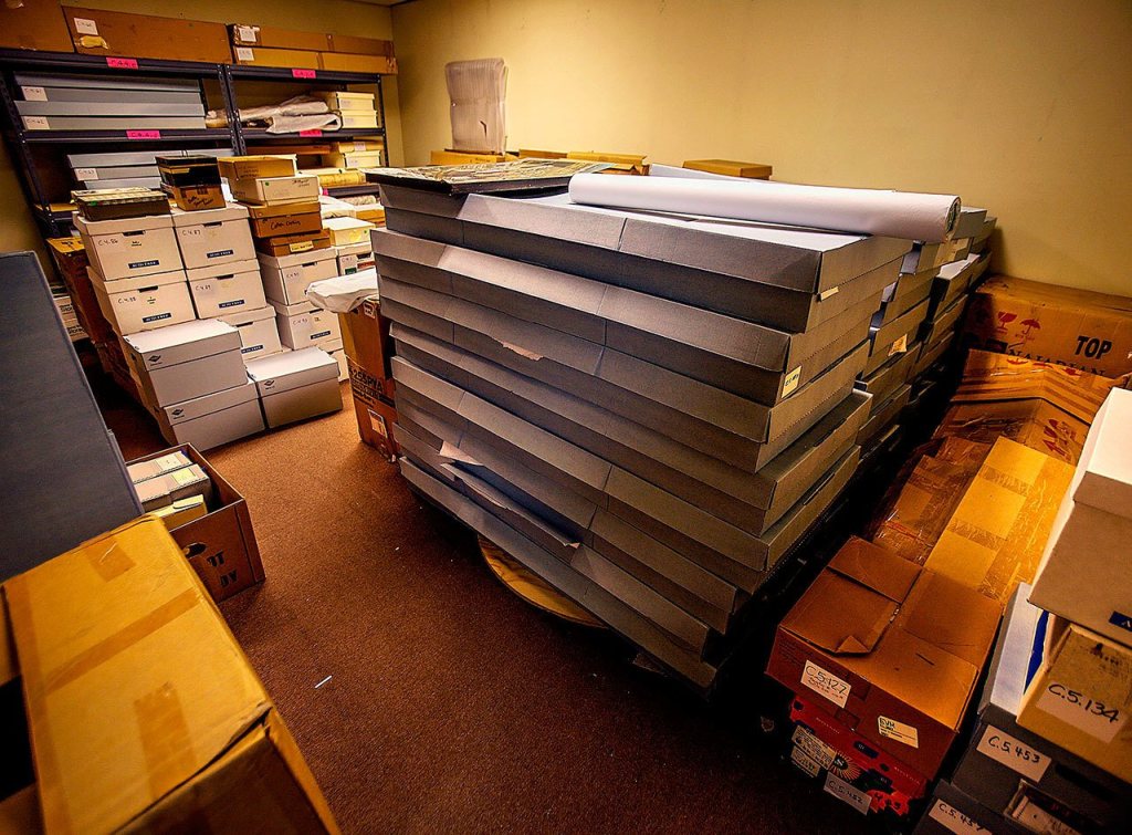 A large number of environmentally sensitive museum items have been stored in acid-free packing boxes. (Dan Bates / The Herald)