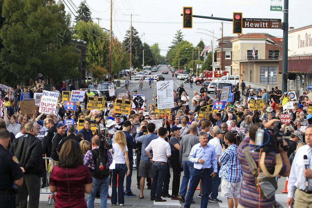 Crowds gather on Hewitt Avenue before a rally for Republican presidential nominee Donald Trump at Xfinity Arena in Everett on Tuesday. (Ian Terry / The Herald)