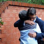 James Snow hugs his mother Ruth Perin after unveiling a tile in September of last year in honor of his brother Peter John Snow, who was killed by a drunk driver in 1994. Thirteen names were added to the DUI victims memorial wall during the ceremony in McCollum Parkon Sept. 17, 2015. (Genna Martin / Herald file photo)