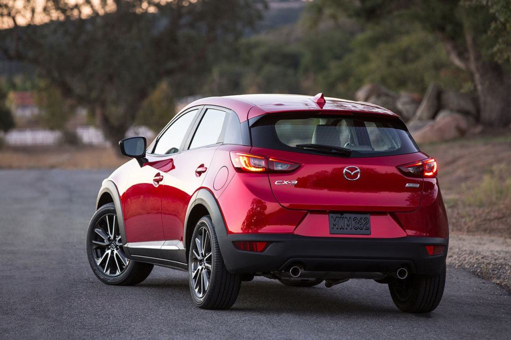 The 2016 Mazda CX-3 has a rear hatch accessing a small cargo area that can be significantly increased by folding down the second-row seats. (Manufacturer photo)