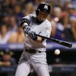 Miami pinch-hitter Ichiro Suzuki records his 2,999th career hit, a single, off Colorado relief pitcher Jordan Lyles in the eighth inning Saturday in Denver. Ichiro grounded out to the mound in his first attempt at No. 3,000. (AP Photo/David Zalubowski)