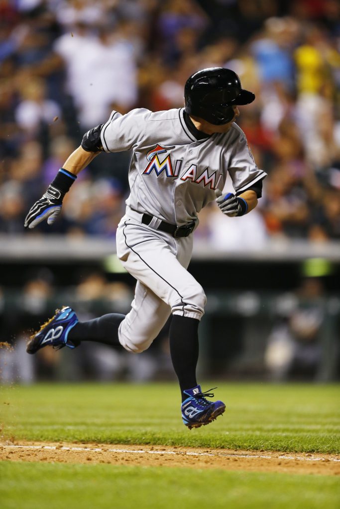 Miami Marlins&rsquo; Ichiro Suzuki legs out a single, the 2,999th hit of his career, against the Colorado Rockies during the eighth inning Saturday in Denver. (AP Photo/Jack Dempsey)