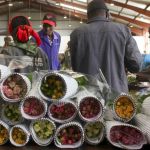 Workers pack roses for Valentine&rsquo;s Day at the AAA Growers&rsquo; farm in Nyahururu, Kenya.
