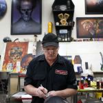 Airbrush artist Mike Lavallee works in his studio in Snohomish on Wednesday. Photo taken on 01202016