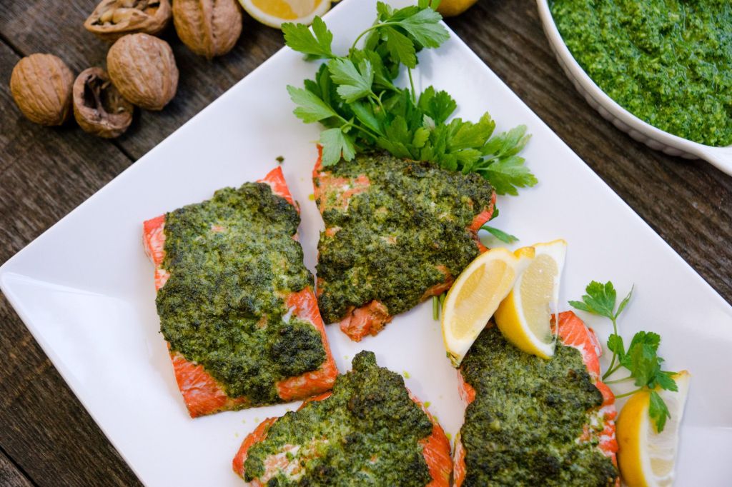 Include familiar ingredients with new dishes, such as salmon with pesto