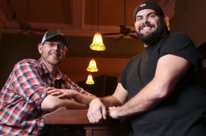 Doug Hall (left) and Jeff Sadighi own and operate The Independent Beer Bar in downtown Everett.