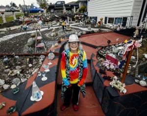 Jacquelyn Dreyer, greeting us here from her front walkway in Everett, has faced serious difficulties of late, but the 73-year-old finds joy in creating her own brand of yard art.