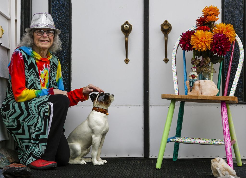 Jacquelyn Dreyer visits with a ceramic pooch waiting at her front door.