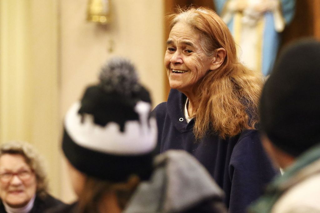 Mary McClurg shares her memories of Rudy Van Delden during his memorial service Thursday night at Our Lady of Perpetual Help Catholic Church in Everett.