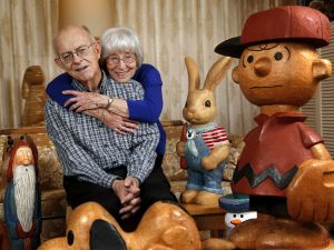 At home in Everett, Ed and Betty Morrow, both 81, enjoy the company of some of Ed&rsquo;s lifelike creations last week. The Morrows were honored by the Everett Museum of History for long-time community involvement, plus their efforts to establish a much-needed museum in Everett.