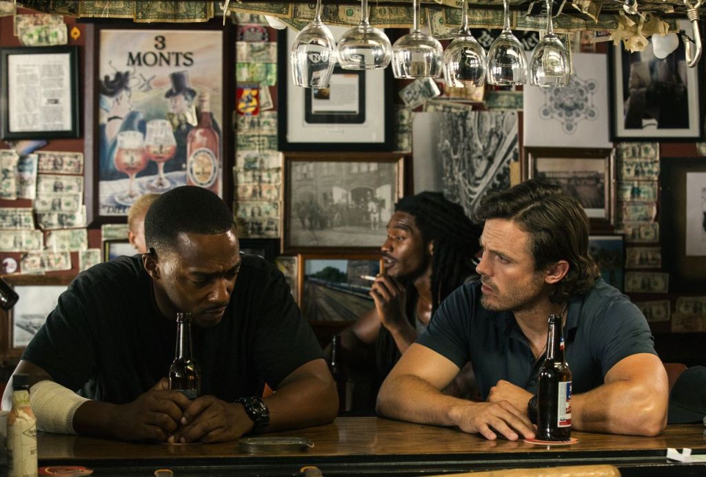 Anthony Mackie and Casey Affleck in a scene from &ldquo;Triple 9.&rdquo;
