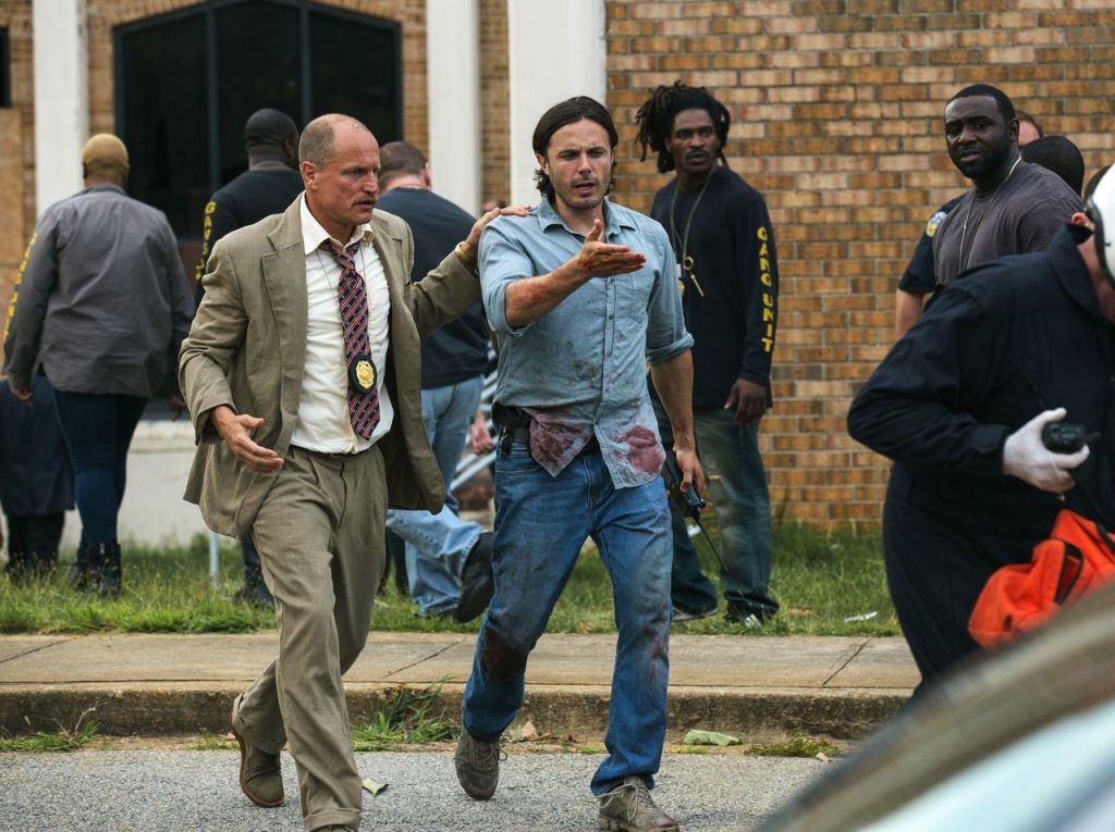 Woody Harrelson and Casey Affleck in a scene from &ldquo;Triple 9.&rdquo;