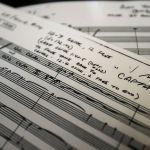 Dan Bates / The Herald Ron Jones turns a page in the original score from Star Trek, The Next Generation, from "Best of Both Worlds." The London Symphony wanted to do the cues for "First Attack" and "Captain Borg," which is where the Borg turned Captain Picard into a Borg.