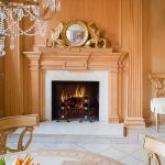 This fireplace by Mary Douglas Drysdale was paneled and then given a wood-grain finish.