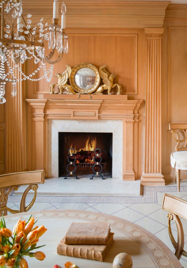 This fireplace by Mary Douglas Drysdale was paneled and then given a wood-grain finish.