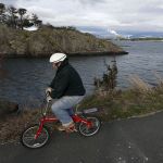A cyclist makes his way along the Tommy Thompson Trail in Anacortes on Feb. 18.