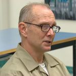 Department of Corrections parole board chairwoman Kecia Rongen (center right) questions Timothy Pauley during his sentence review hearing in January.