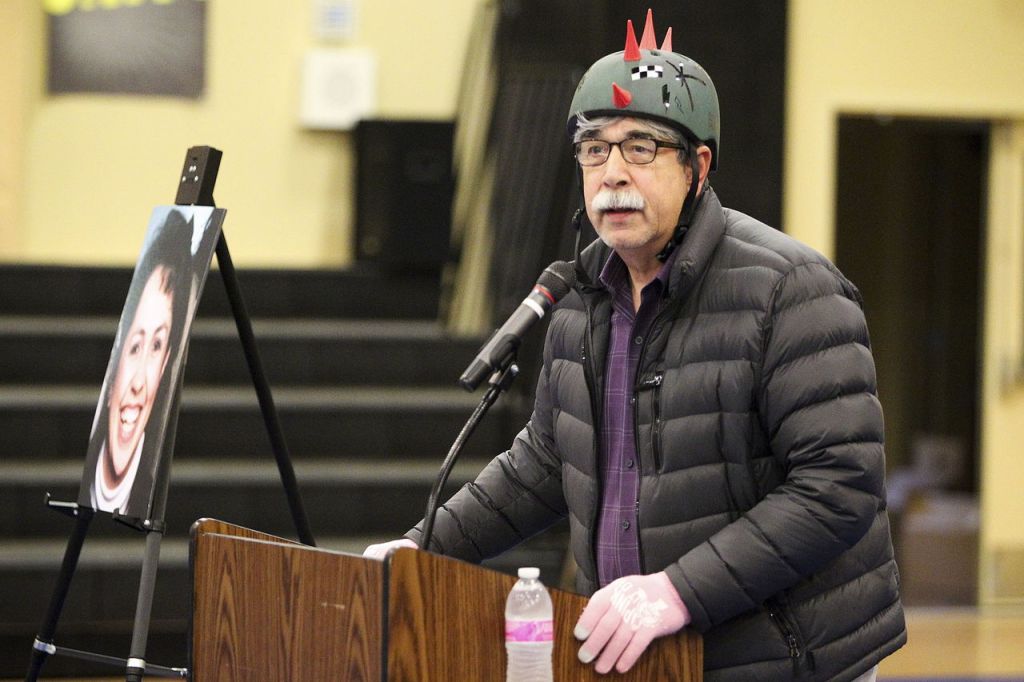 Tulalip chairman Mel Sheldon Jr. wears a skateboard helmet as he addresses a crowd gathered for the official opening of the Debra Barto Memorial Skate Park on Friday.
