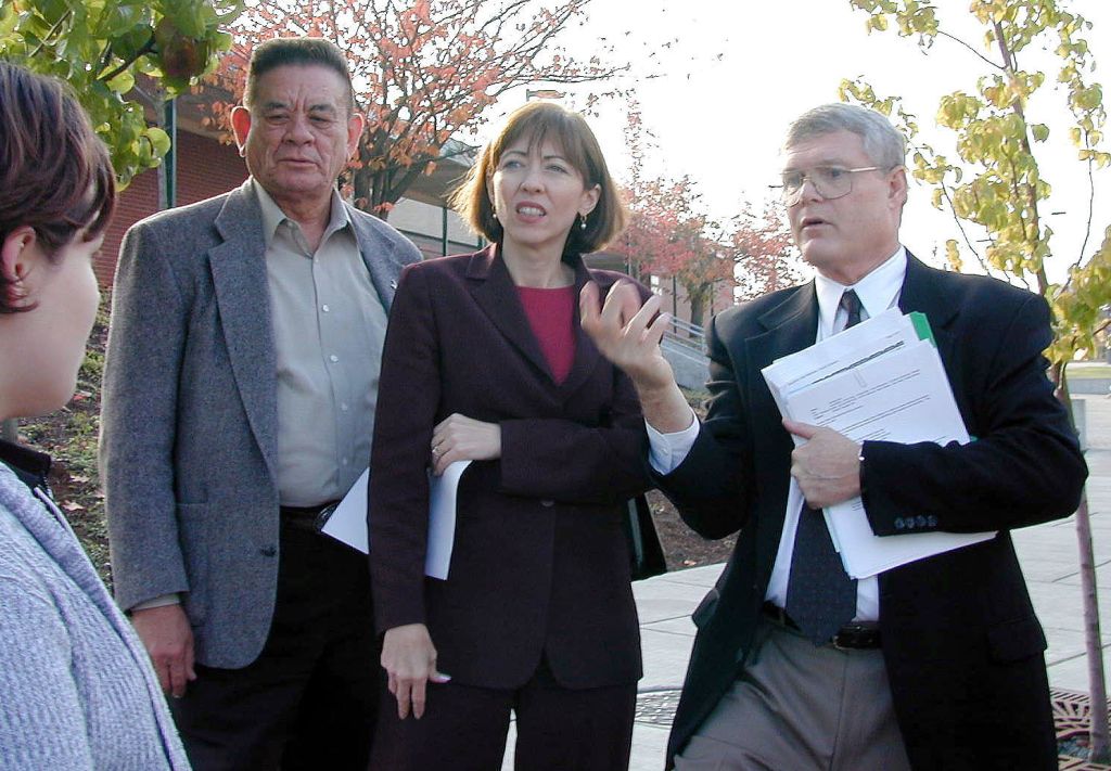 Then-Everett Community College Vice President Pat McClain (right) speaks with Sen. Maria Cantwell, D-Wash., and Tulalip Tribes governmental affairs director John McCoy in 2002, about the college&rsquo;s building needs.