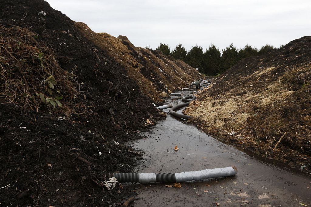 Ventilation hoses snake through piles of compost on the Bailey Farm on Springhetti Road in Snohomish on Wednesday. The air flow keeps smell at a minimum by preventing the need for the compost to be constantly turned.