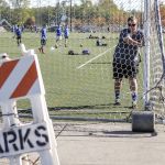 Sean Connors repositions a goal before practice at Kasch Park near Paine Field on Thursday in Everett. A $2.9 million makeover will take all three fields out of commission for most of the summer.