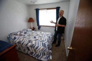 Executive Pastor Dan Hazen shows off a one of the bedrooms in a house that will house three former homeless men on Thursday, Mar. 31, 2016 in Marysville, Wa. Marysville is opening its first home for formerly homeless people, as a pilot project, with only 3 or 4 residents who have been through substance abuse treatment programs, and it&rsquo;s managed jointly with the faith community.