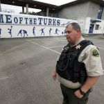 Craig Hess, a school resource officer with the Snohomish County Sheriff&rsquo;s Office, walks the grounds of Sultan High School on Friday. Being on foot feels at home to Hess, who used to work for the New York Police Department.