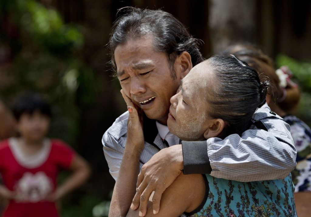 In this May 16 photo, former slave fisherman Myint Naing and his mother, Khin Than, cry as they are reunited after 22 years at their village in Mon State, Myanmar. The Associated Press won the Pulitzer Prize on Monday for public service for articles documenting the use of slave labor in the commercial seafood industry in Indonesia and Thailand.