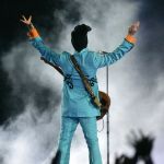 In this Feb. 4, 2007, photo, Prince performs during the halftime show at Super Bowl XLI at Dolphin Stadium in Miami.
