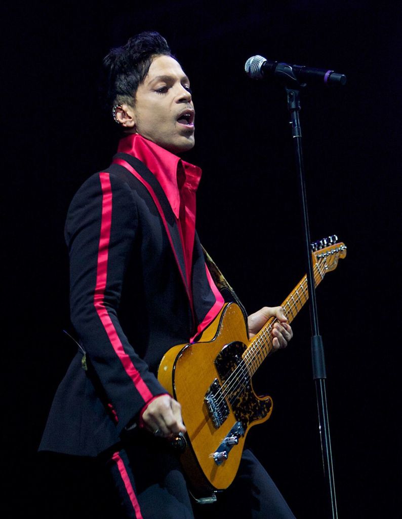In this Nov. 14, 2010, photo, Prince performs in Yas Island, on the final night of the F1 motor race meeting in Abu Dhabi, United Arab Emirates.