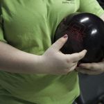 Everett&rsquo;s Candice Goldinch gets her grip set while practicing with the rest of the Everett High School bowling team Tuesday at Evergreen Lanes in Everett.