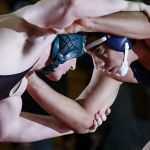 Marysville Getchell&rsquo;s Troy Woodruff (left) goes head to head against Arlington&rsquo;s Adalberto Ramos on his way to winning the 220-pound title match at the 3A regionals Saturday at Marysville Pilchuck High School.