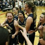 Arlington&rsquo;s (from left) Selena Gutierrez, Kelsey Mellick, Serafina Balderas, Tahlia Miears and Sevi Bielser celebrate their 49-30 victory over Bishop Blanchet in a 3A state regional game on Saturday at Mountlake Terrace High School.